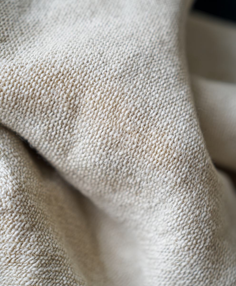 Close-up van zachte natuurlijke stof voor comfortabele babyproducten